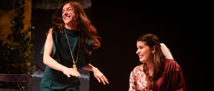 In a scene from Much Ado About Nothing, two young women are elated over upcoming nuptials.