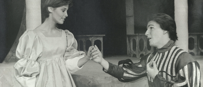 Wearing Elizabethan costumes, a young man woos a young woman in the 1978 production of Twelfth Night.