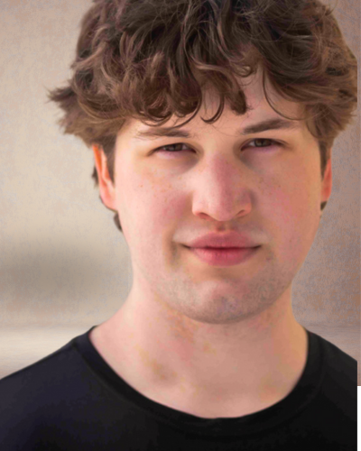 Portrait of Daniel Pawlyk, a white college student with tousled hair, wearing a black t-shirt.