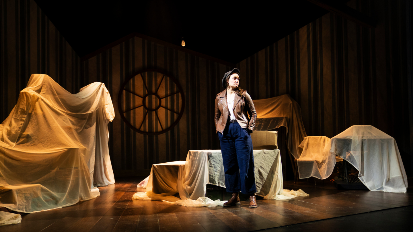 Wendy enters the attic, various objects are covered in white sheets